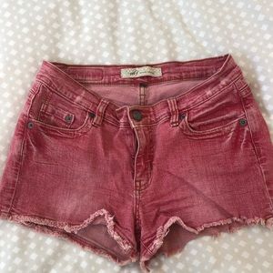 Red cutoff jean shorts